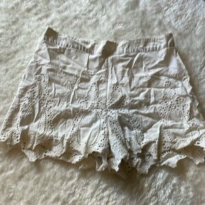 White shorts with lace design